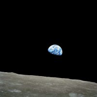 历法校对人员对照天文年历与中国日历资料逐条比对的近景画面，屏幕上显示节气时刻表格